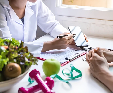 Healthcare professional providing personalized wellness education to a patient