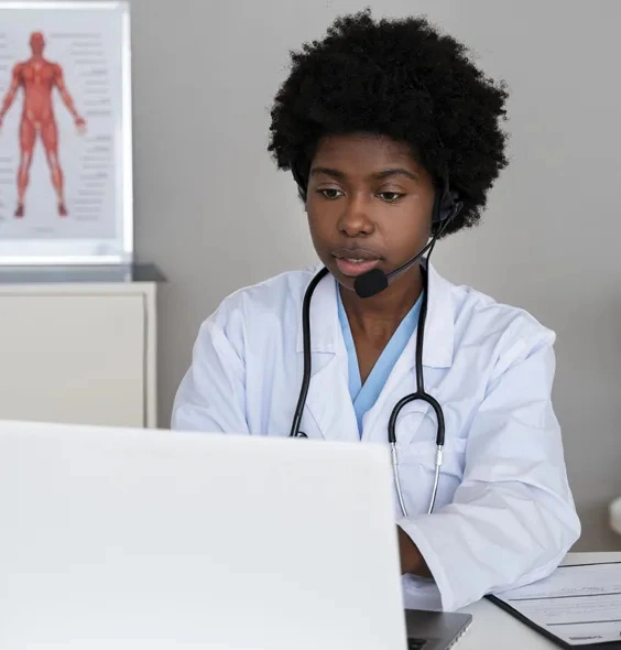 Professional Naturopathic Doctor at Drs2health providing a virtual consultation on a laptop. The image represents the expert medical practitioners serving patients in the Bronx and NYC via secure telehealth and in-person appointments.
